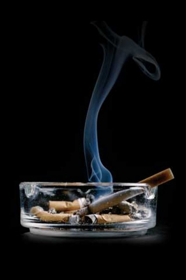 Cigarettes on Ashtray Wallpaper